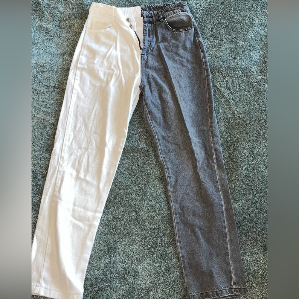 White and faded black jeans